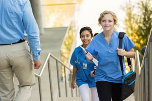 Nurses walking up stairs